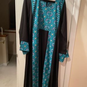Traditional Palestinian blue dress from the Middle East.